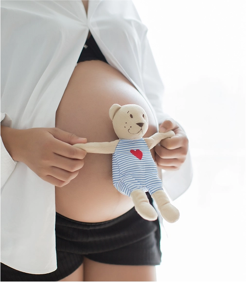 Pregnant woman with Doll 
