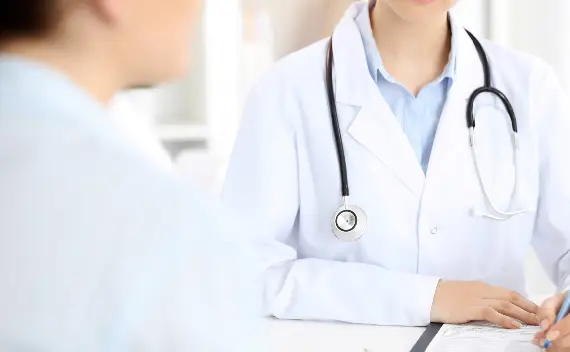 doctor patient are communicating while sitting table medicine very bad news concept