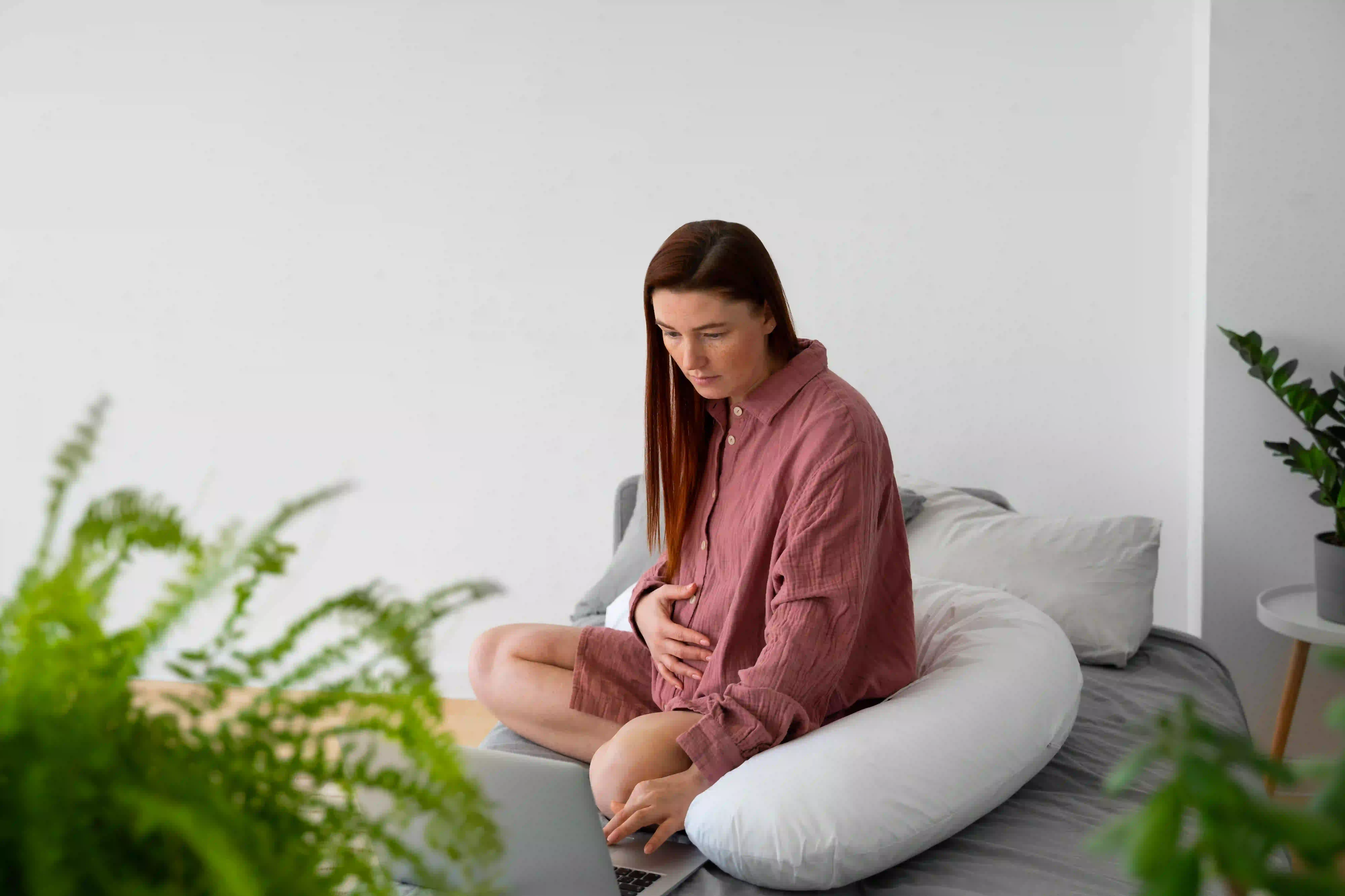 full-shot-pregnant-woman-sitting-home Do Appointments Have to Be In Person