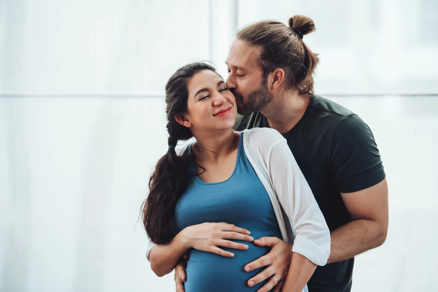 happy-couple-pregnant-woman-husband-stay-home-living-room-1536x1025