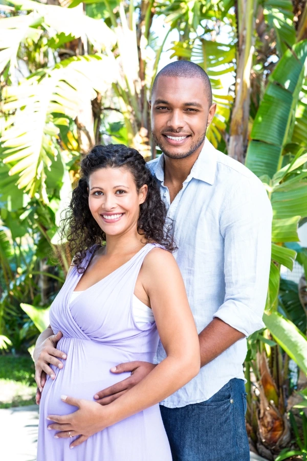 portrait-happy-husband-touching-pregnant-wife-belly