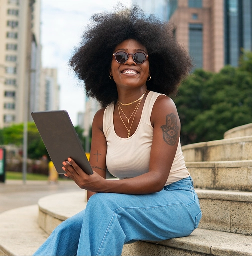 woman sitting on steps and enjoying her day